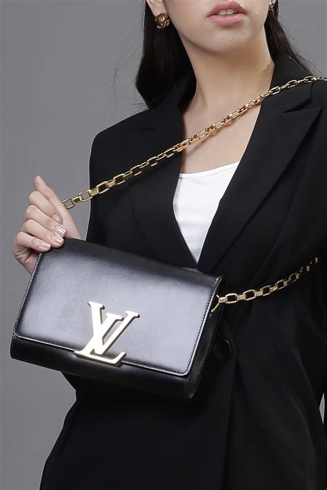 louis vuitton small purse with gold chain|louis vuitton chain louise black.